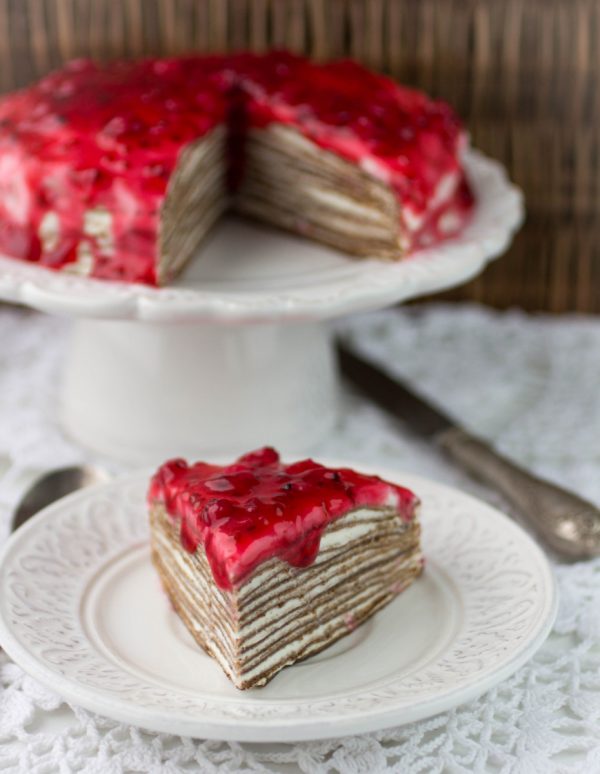 cake of chocolate crepes with curd cheese. selective focus