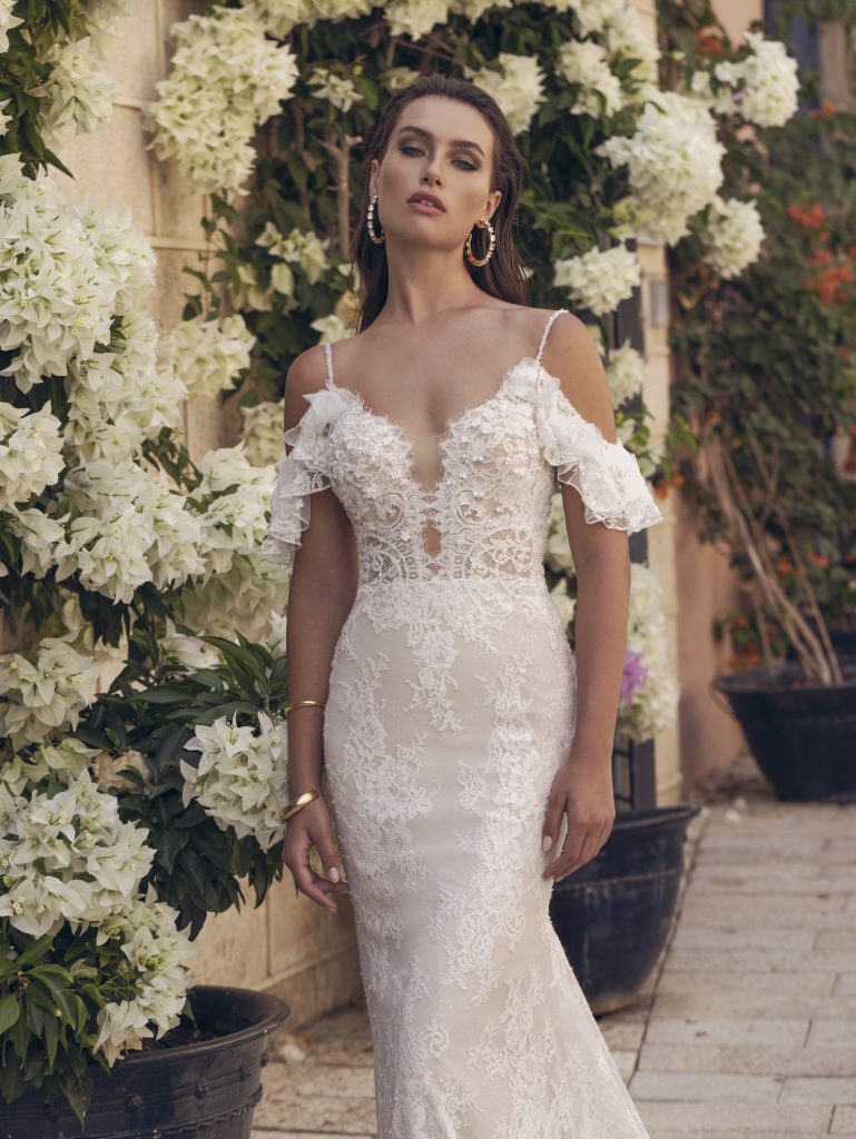 In questa foto focus sulle maniche in un abito della collezione Capri sposa 2022.