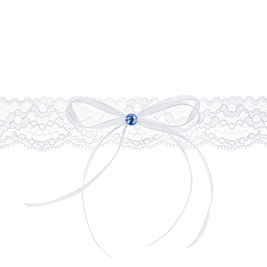 In questa foto una giarrettiera da sposa con fiocco e cristallo colore blu