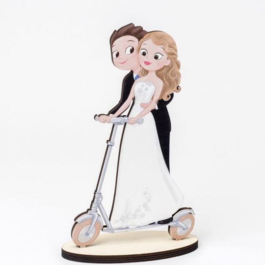 In questa foto un cake topper, tra le idee per matrimonio più scelte