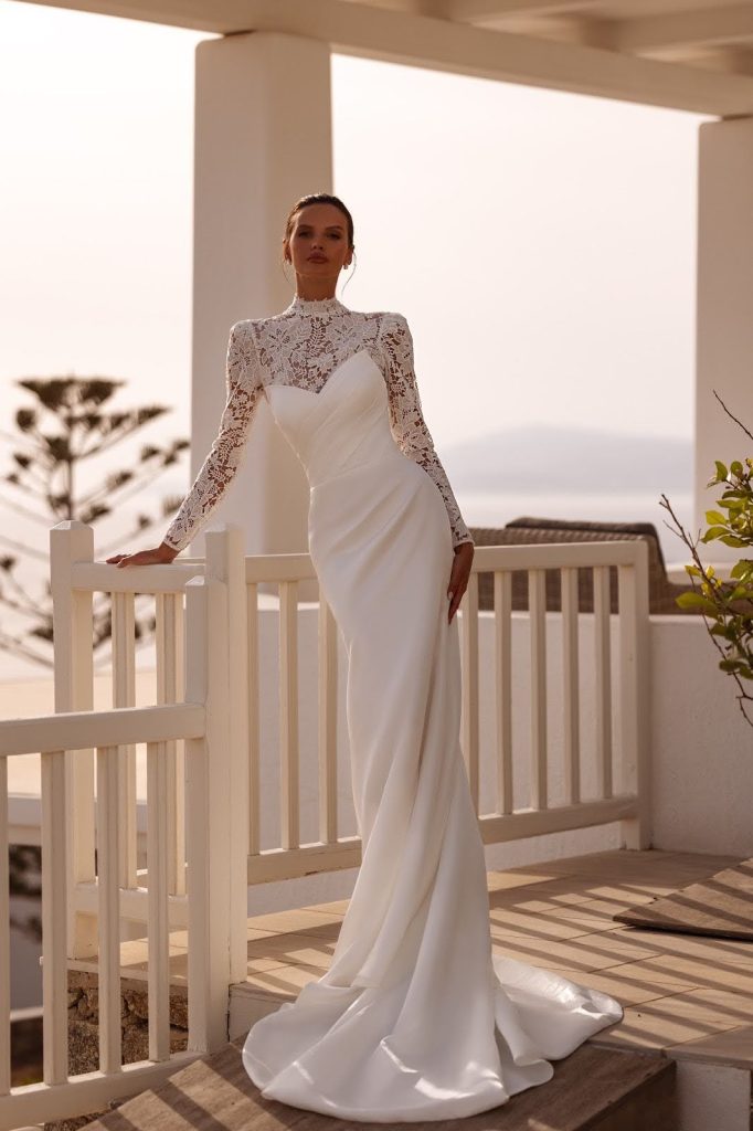 In questa foto abito da sposa con pizzo 